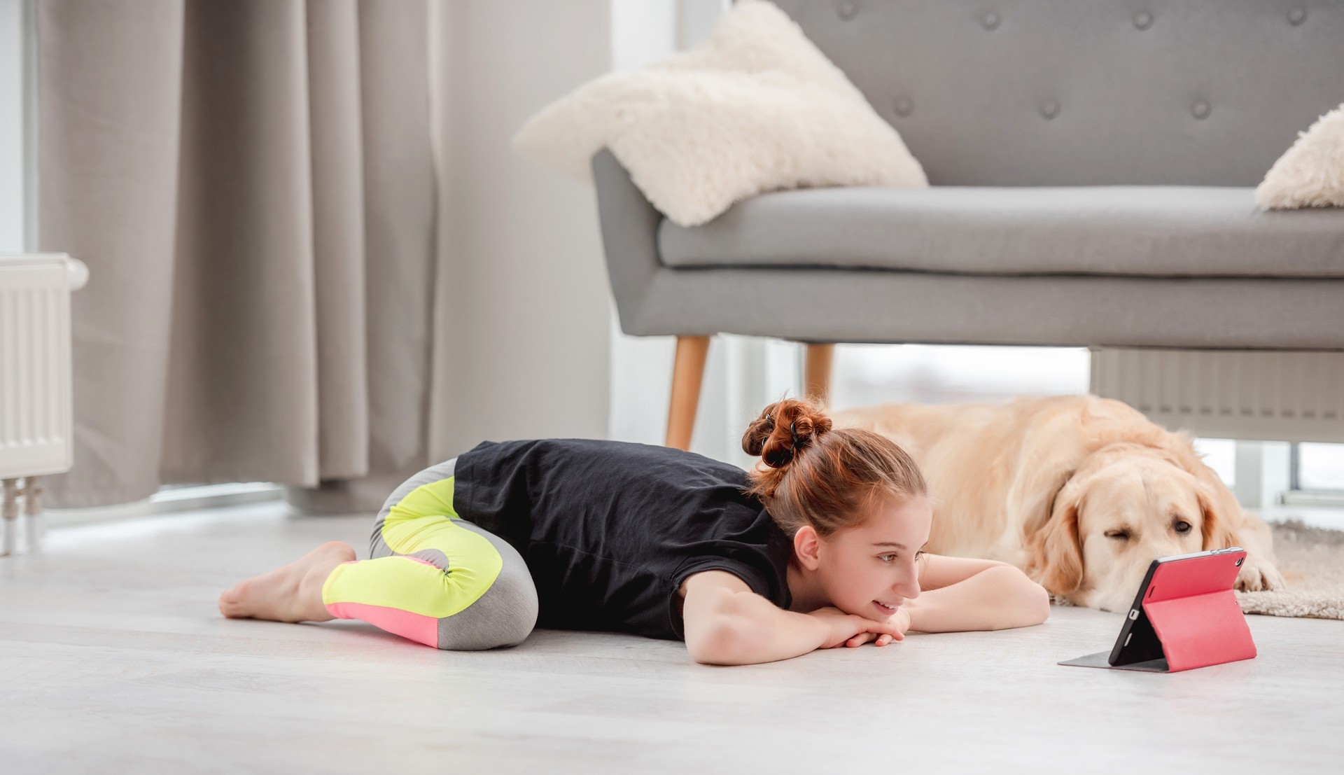 Girl making workout with tablet